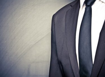 Kleidung im Job – Outfit zeigt in welcher Liga man spielt